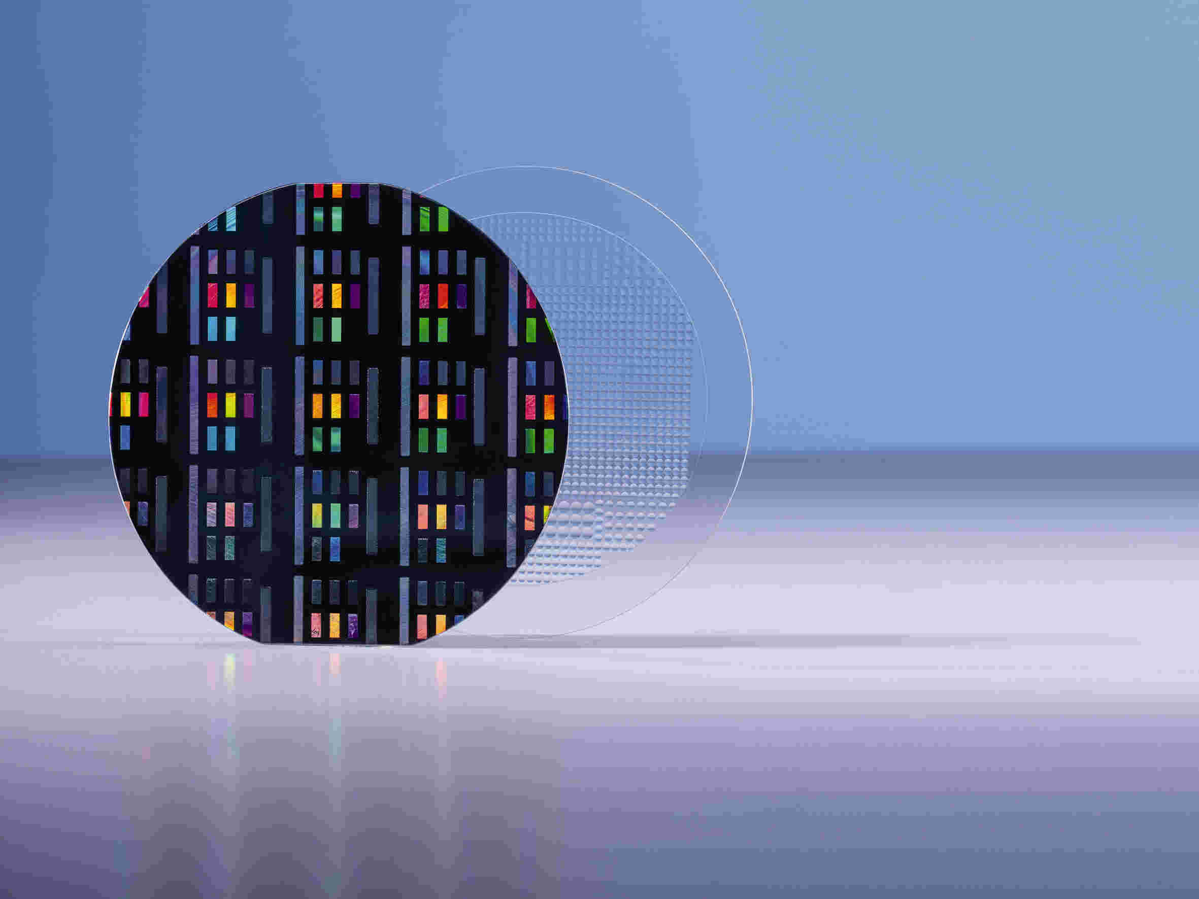 Wafer-level nanoimprint lithography (left) and lens molding (right) enable small-form-factor and high-resolution optical sensors for applications such as 3D sensing. Image courtesy of DELO.