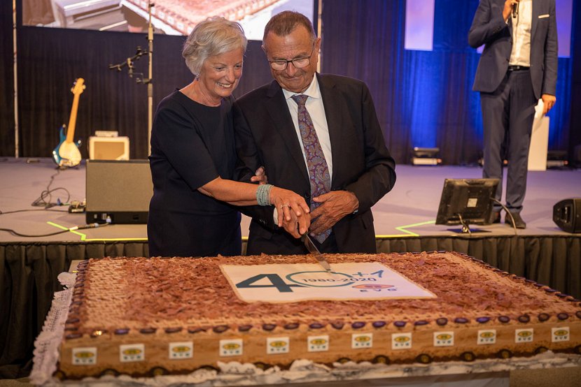 Birthday cake cutting ceremony with Mrs Aya Maria and DI Erich Thallner