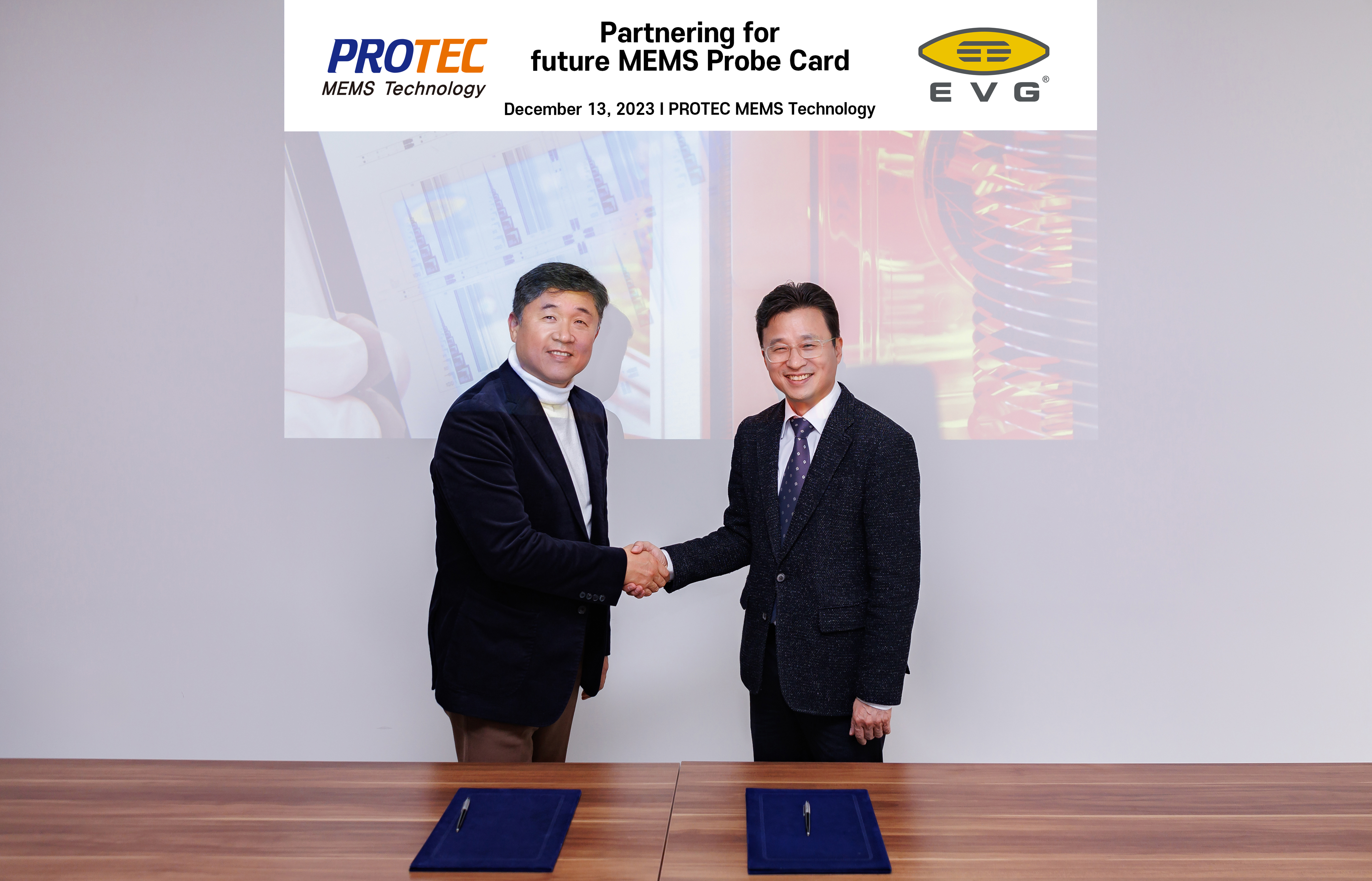 PROTEC MEMS Technology (PMT) and EV Group sign agreement on maskless lithography for advanced wafer memory probe card manufacturing. Shown here from left to right are Mr. Yong-Ho Cho, CEO of PMT, and Mr. Young-Sik Yun, general manager of EV Group Korea.